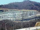 Visible in this Appalachian Basin classic exposure of the Pound Gap Road Cut in Kentucky on Route 23 at the front of the Pine Mountain Thrust are, from the base up, the Mississippian rocks of the Grainger, the Newman Limestone through Pennington Formations