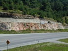 Silurian, Bisher Formation at Herron overlain by Devonian Ohio Shale. Bisher is high energy shallow water carbonate