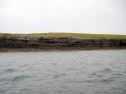 Kilcredaun Cliffs exposing thin bedded turbidite channel fill and turbidite sand lobes in the Upper Carboniferous Namurian Ross Formation. Photographs taken from the fishing vessel Draiocht out of Carrigaholt on the northern shore of the Shannon Estuary.